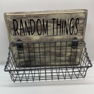 Wood sign with attached wire basket for organizing