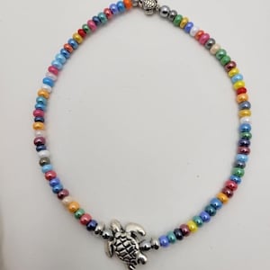 Multi colored glass bead anklet with turtle charm