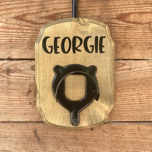 StallMate®  is a hanging &quot;over the stall &quot; personalized horse sign with attached  bridle/halter hook