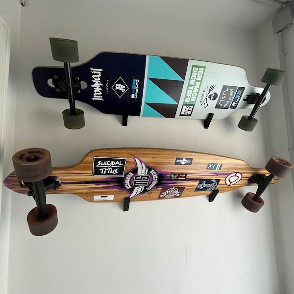 Soporte de pared para monopatines/longboards