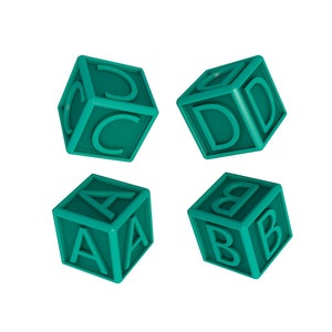 May include: Four teal alphabet blocks, each displaying a different letter. The blocks are arranged at various angles, showcasing the letters A, B, C, and D. The letters are in a bold, sans-serif font, and the blocks are set against a white background.