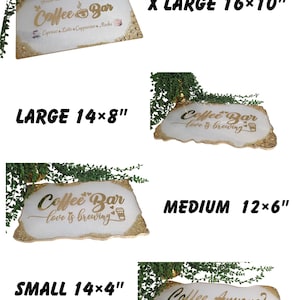 May include: A collection of decorative coffee bar signs in various sizes. The signs have a white background with gold glitter edges and gold lettering. The sizes are X Large 16x10 inches, Large 14x8 inches, Medium 12x6 inches, and Small 14x4 inches.