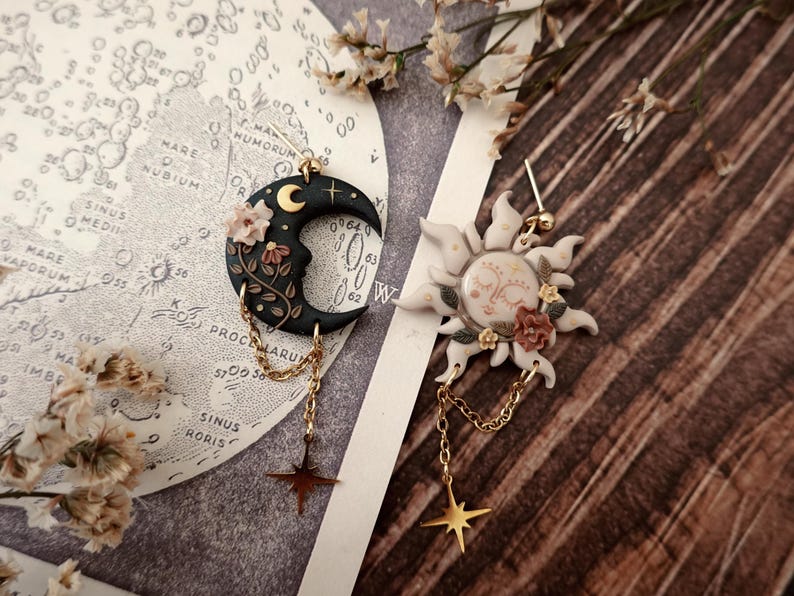 fairycore, pastel goth, mushroom decor, nature inspired, boho charm, celestial vibes, magical creature, herbology, enchanted forest, moonchild, spiritual gift, witchy aesthetic, moon phases, cottage witch, dreamy charm, rustic jewelry, terrarium style, fantasy charm, garden witch, starry night, luna moth, folk art jewelry, springtime vibes, tiny treasures, cozy decor, handmade aesthetic, fae realm, mystical charm, woodland magic, celestial gift, dark cottagecore witch Sun and Moon