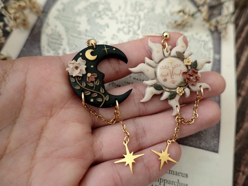 fairycore, pastel goth, mushroom decor, nature inspired, boho charm, celestial vibes, magical creature, herbology, enchanted forest, moonchild, spiritual gift, witchy aesthetic, moon phases, cottage witch, dreamy charm, rustic jewelry, terrarium style, fantasy charm, garden witch, starry night, luna moth, folk art jewelry, springtime vibes, tiny treasures, cozy decor, handmade aesthetic, fae realm, mystical charm, woodland magic, celestial gift, dark cottagecore witch Sun and Moon