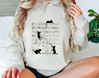 Lindo gato gatito tocando música nota clave músico arte sudadera con capucha, gato divertido notas musicales sudadera con capucha, gato y amante de la música, divertido músico nota sudadera con capucha