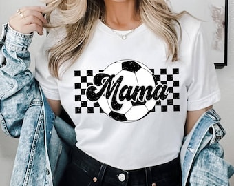 May include: White t-shirt with a black and white checkered design and a soccer ball with the word "Mama" in a retro font.