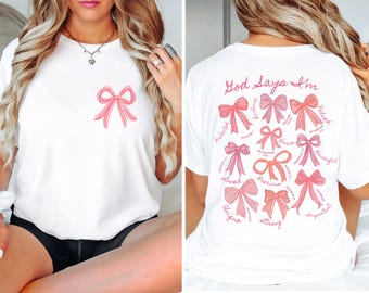 God Says I Am Coquette Bow Shirt, Comfort Colors Christian Shirt,Christian Girl Gifts, Valentine Shirt,Women Christian Tee,Pink Coquette Bow