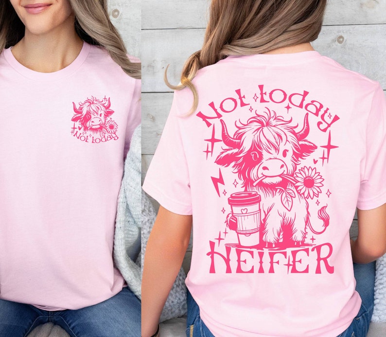 May include: Pink t-shirt with a pink graphic of a cow holding a coffee cup and a flower. The text "Not today, Heifer" is printed on the shirt.
