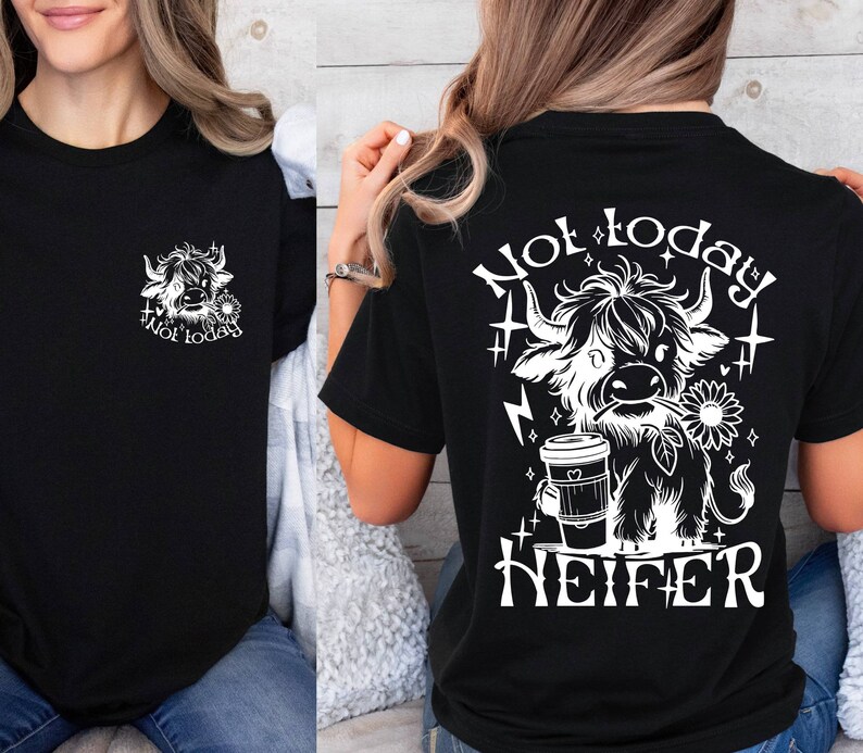 May include: Black t-shirt with a white graphic of a Highland cow holding a coffee cup and the text "Not today, Heifer".