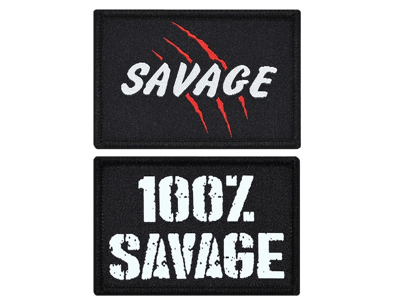 May include: Two black rectangular patches. The top patch has the word "SAVAGE" in white with red claw marks. The bottom patch reads "100% SAVAGE" in white, bold, distressed font.