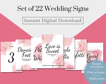 May include: A collection of 22 wedding signs featuring a pink and gold watercolour design. The signs include table numbers, instructions, and phrases such as "Love is Sweet" and "Guest Book." The words "Instant Digital Download" are also visible.