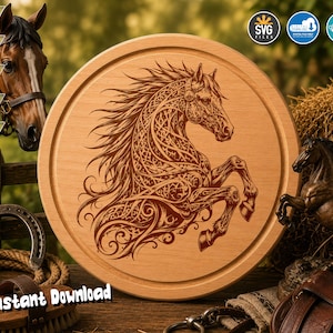 May include: A round wooden board featuring a laser-engraved design of a rearing horse with intricate knotwork patterns. The board has a smooth, light-colored wood grain surface. The design is centered on the circular board, showcasing detailed mane and tail textures.