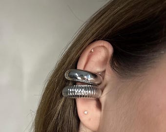 Chunky silver or gold tone ear cuff modern trendy 2026
