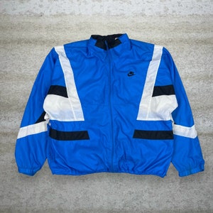 blue black and white nike windbreaker