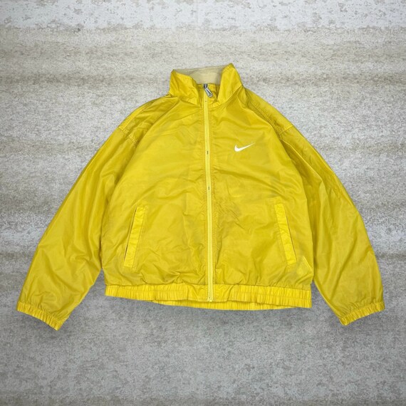 Yellow nike windbreaker mens hotsell