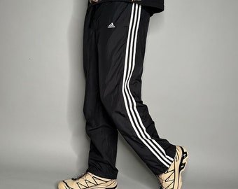 Vintage Adidas pantalones de chándal hombres M negro poliéster blanco 3 rayas tiene cremalleras de tobillo Y2K