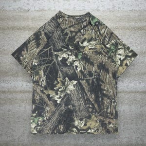 Camisa vintage Mossy Oak masculina tamanho M, camuflagem para caça, algodão, manga curta, estilo florestal.