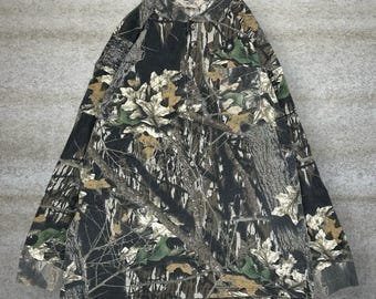 Camiseta vintage Mossy Oak de los 90 para hombre, talla XL, estilo camuflaje de caza, manga larga, con bolsillo, de algodón.
