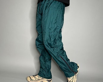 Vintage Track Pants Hombres L Forest Green Nylon Baggy Fit tiene cremalleras en el tobillo para llamarada de los años 90