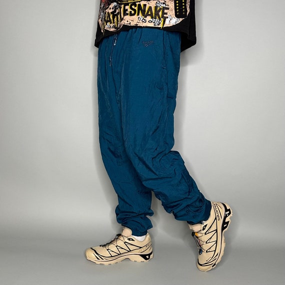 Vintage Reebok Track Pants Mens L Slate Blue Nylon Joggers Subtle Embroidered Logo Has Ankle Zippers to Flare Elastic Cuffs Lined 90s Etsy Ireland
