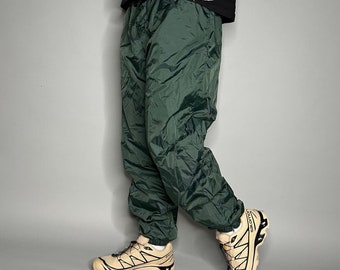 pantalon de survêtement vintage pour hommes L vert forêt en nylon jogger poignets élastiques a fermetures éclair à la cheville doublé des années 90