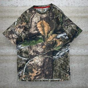Camisa vintage Mossy Oak masculina tamanho M, camuflagem para caça, algodão, manga curta, estilo florestal.