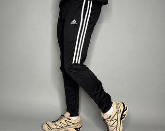 pink and black adidas tracksuit