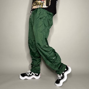 パンツ 90s old NIKE nylon wide pant dark green vintage 90s NIKE TRACK Nylon sweatpants Brand: | Depop