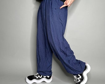 Vintage 90s blue Nike track pants, size xl, good - Depop