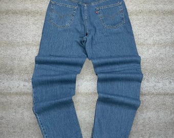 Vintage 90er Jahre Levis 550 Jeans 36x33 Relaxed Fit Medium Wash Denim Red Tab