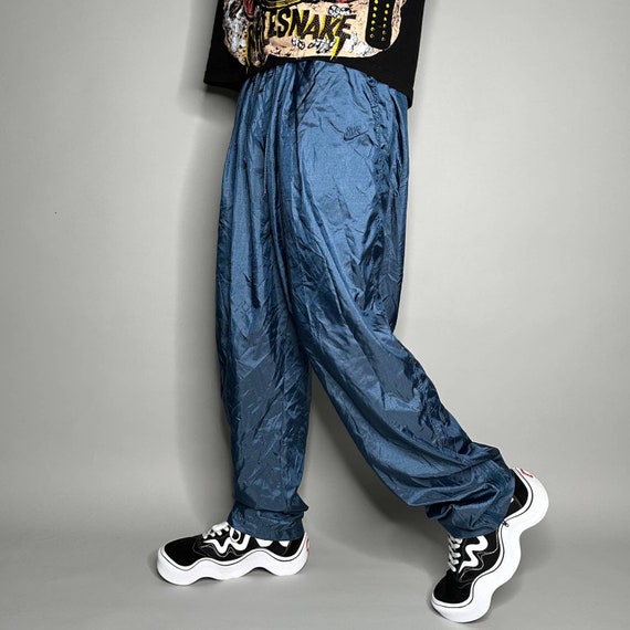 Blue nike sales track pants