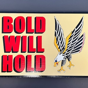 Hand painted “BOLD WILL HOLD” traditional tattoos sign. Eagle.