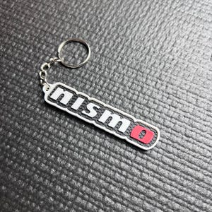 Llavero Nismo, Nissan GTR, Skyline GTR, Godzilla, Nissan Nismo, R34, R33 GTR, 370Z, Nismo, Drifting, Llavero de coche, Carreras Nismo, Regalo para coche