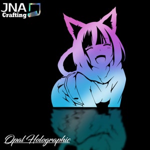 May include: A holographic sticker featuring an anime-style character with cat ears, smiling widely. The character's outline is in black, with a gradient of blue and purple. The text "JNA Crafting" and "Opal Holographic" are also visible.