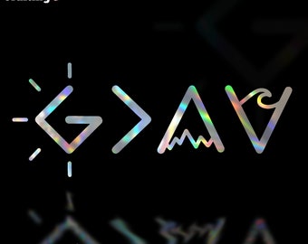 May include: A silver holographic sticker with the text "G>A<V" in a modern, minimalist style. The sticker features a sun, an arrow, a mountain, and a wave.