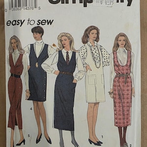May include: A Simplicity 8546 sewing pattern envelope for size P (12-16) featuring illustrations of five different jumper dress styles. The designs include various lengths, necklines, and pocket configurations, paired with long-sleeved shirts.