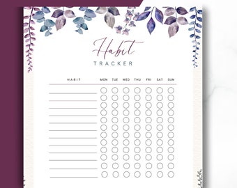 May include: A printable habit tracker with a floral design. The tracker has a section for the habit name and columns for each day of the week.  The floral design features purple and blue watercolor leaves.