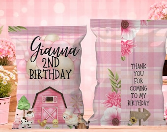 May include: Two rectangular snack bags with a pink plaid pattern. The left bag features a pink barn, farm animals, and text reading Gianna 2nd Birthday. The right bag displays floral graphics and text reading Thank You For Coming To My Birthday.