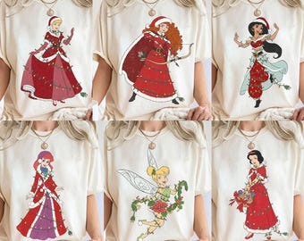 Koszulka z motywem świątecznych światełek Disney Princess w stylu vintage, koszulka świąteczna Disney Girl's Trip, Moana, Aurora, Roszpunka, Alicja, Ariel, Bella, Kopciuszek, Elsa, Dżasmina