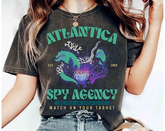 Camiseta de Disney "La Sirenita Flotsam and Jetsam", camiseta de la Agencia de Espionaje Atlantica (fundada en 1989), camiseta familiar a juego de Disneyland, camiseta de viaje a Disneyland