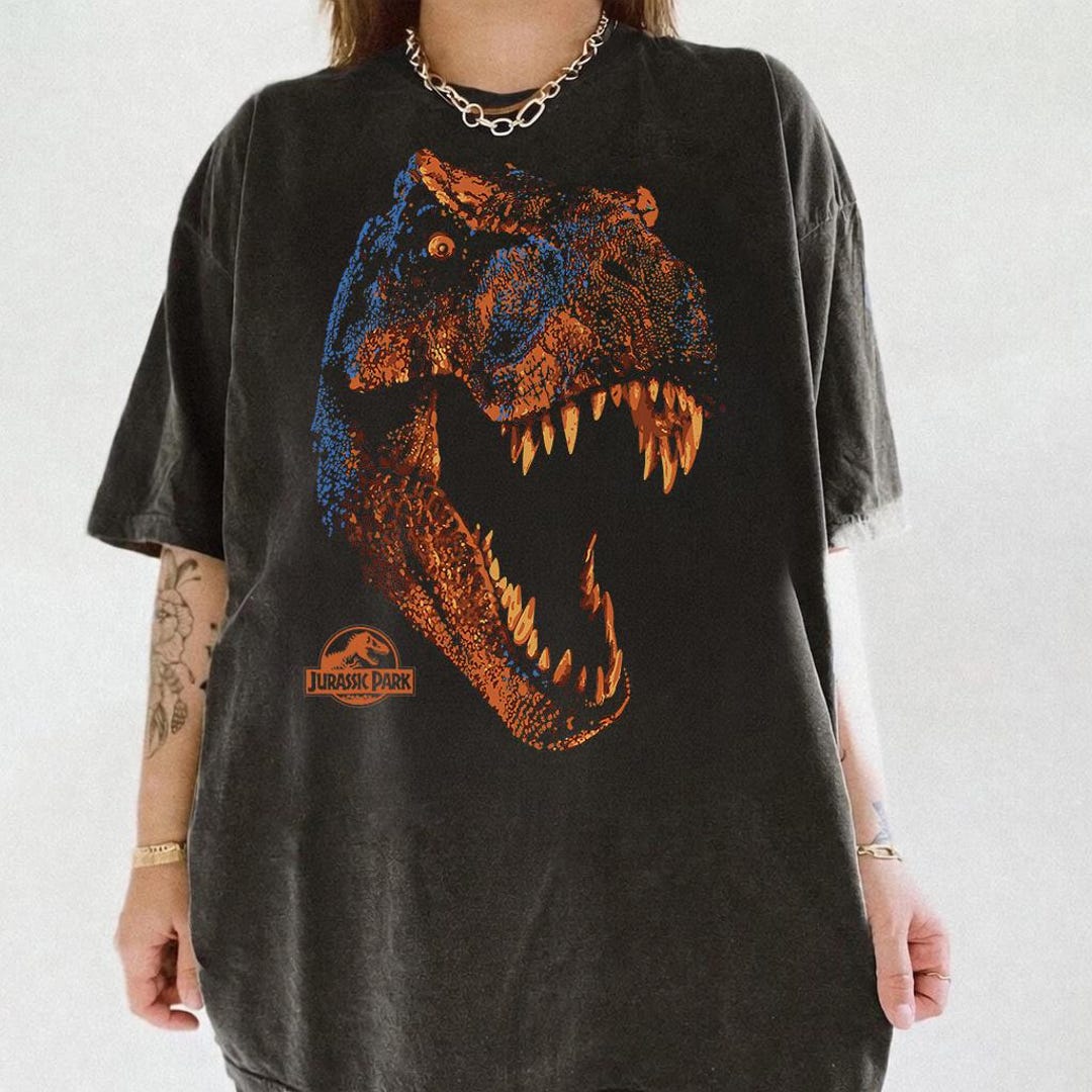 ジュラシック・パーク T-Rex オレンジヘッド 咆哮グラフィックシャツ