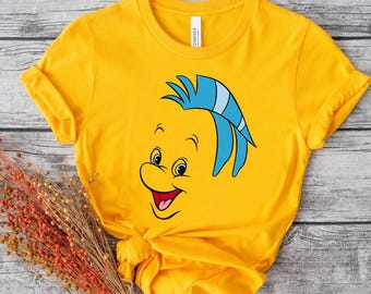 Camiseta de La Sirenita de Disney con cara grande de Flounder, camiseta familiar a juego de Disneyland, regalo para viaje a WDW, camiseta de Magic Kingdom