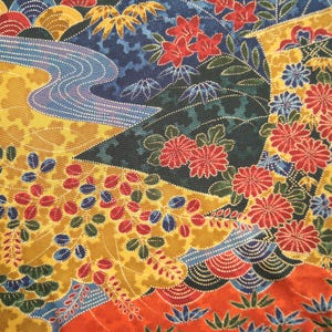 May include: A fabric featuring a dense, intricate pattern of red and blue chrysanthemums, golden yellow foliage, and flowing blue water streams. The design incorporates geometric grid textures, fan-shaped motifs, and small dotted details throughout.