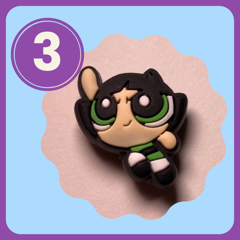 May include: A green, black, and white cartoon character with a green and white striped shirt. The character is from the Powerpuff Girls cartoon.