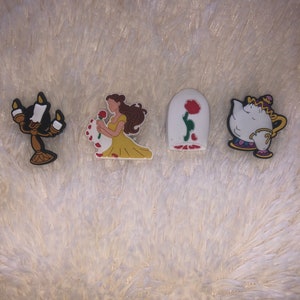 Beauty and the beast Croc charms