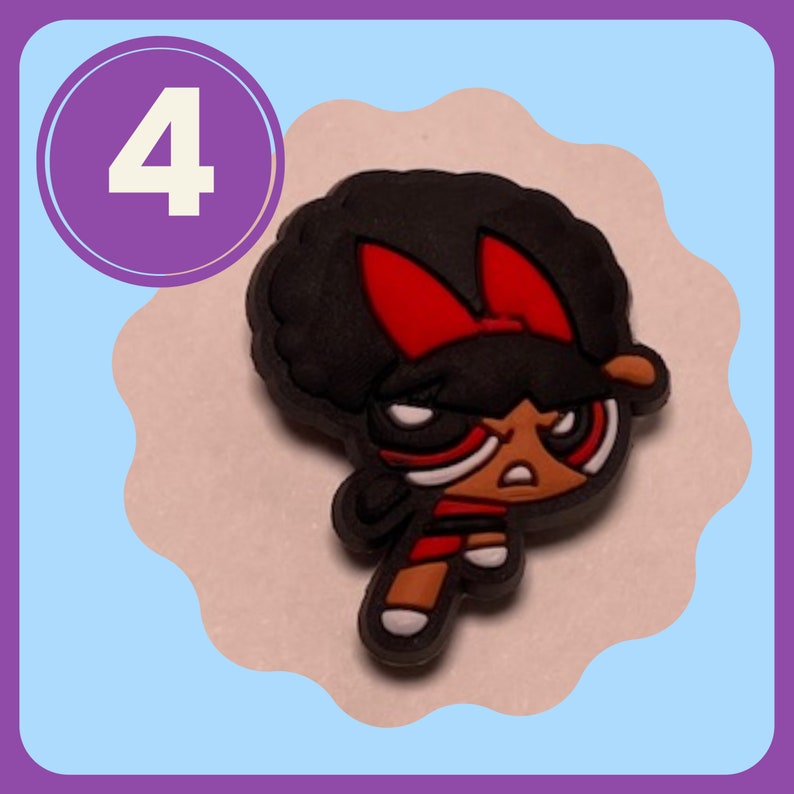 May include: A black and red cartoon character with an angry expression. The character has a large afro and is wearing a red bow.
