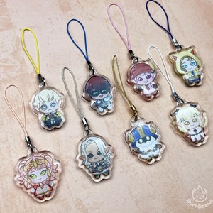 May include: Eight colorful character charms with different designs, each attached to a string with a loop at the top. The charms are made of clear plastic and feature various characters with different hairstyles, clothing, and accessories.