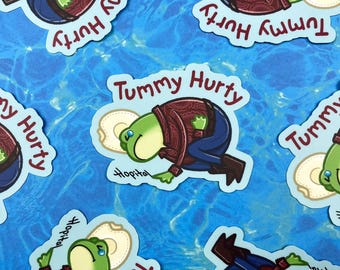 Pegatina de la rana vaquera Tummy Hurty Bean: pegatina laminada mate de 3 pulgadas