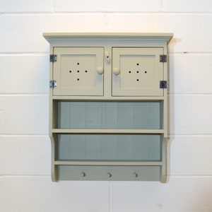 Cupboard with Shelves and pegs