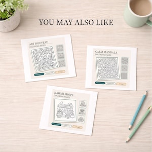 May include: Three coloring page designs are displayed on a light wooden surface. The pages are titled "Art Nouveau Coloring Pages", "Calm Mandala Coloring Pages", and "Kawaii Shops Coloring Pages". Two pencils and a mug are also visible.